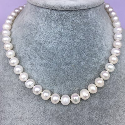 Sophisticated Pearl Charm Necklace